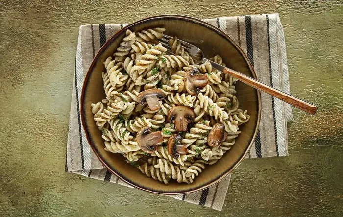Framed Print : Fusilli pasta, in creamy mushroom sauce Framed Print : Fusilli pasta, in creamy mushroom sauce