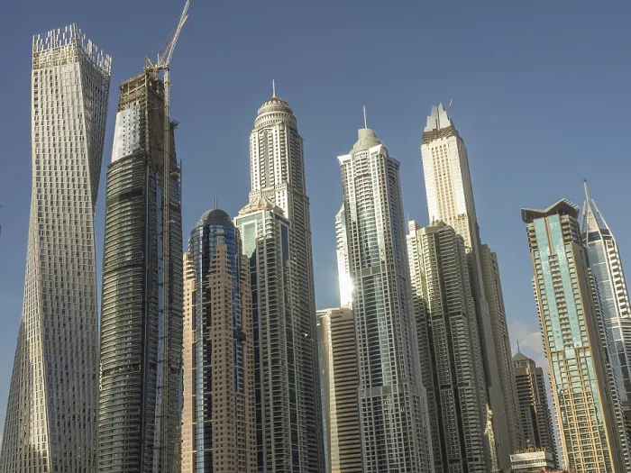 Framed Print : Futuristic skyline with a series of skyscrapers under clear skies