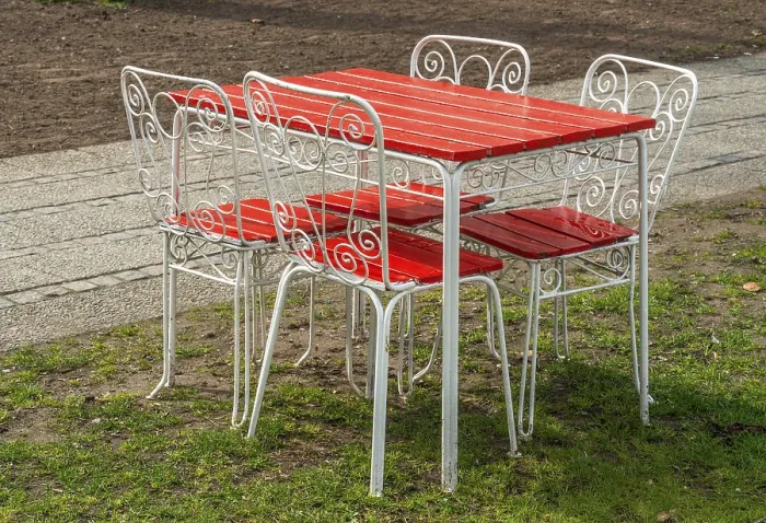 Framed Print : Garden furniture at a cafe prepared for the opening in the spring in Ystad