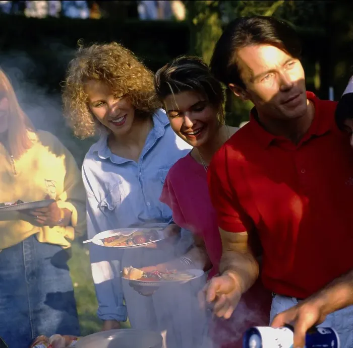 Framed Print : Garden party young people eating Framed Print : Garden party young people eating