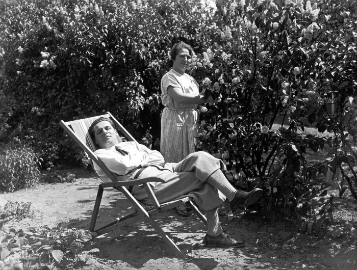 Framed Print : Garden, relaxing in deck chair, ca Framed Print : Garden, relaxing in deck chair, ca