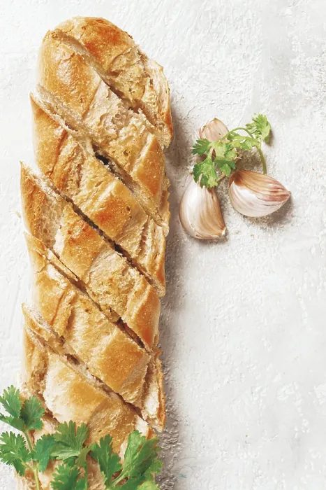 Framed Print : Garlic bread, baguette with garlic butter and herbs Framed Print : Garlic bread, baguette with garlic butter and herbs