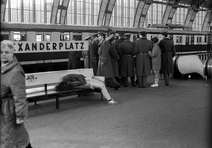 Framed Print : GDR, Berlin, 14. 3. 1988, drunken man on a bench at Alexanderplatz station