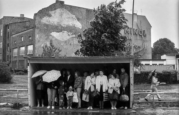 Framed Print : GDR, Berlin, 29.05.1990, Tram shelter with GDR citizens at the head in WeiBensee
