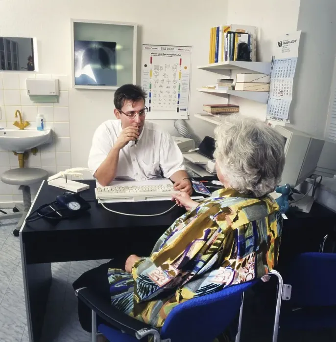 Framed Print : This general practitioner, seen here on 26