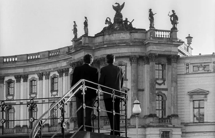 Framed Print : Germany, Berlin, 19 May 1991, two men looking at the chest of drawers