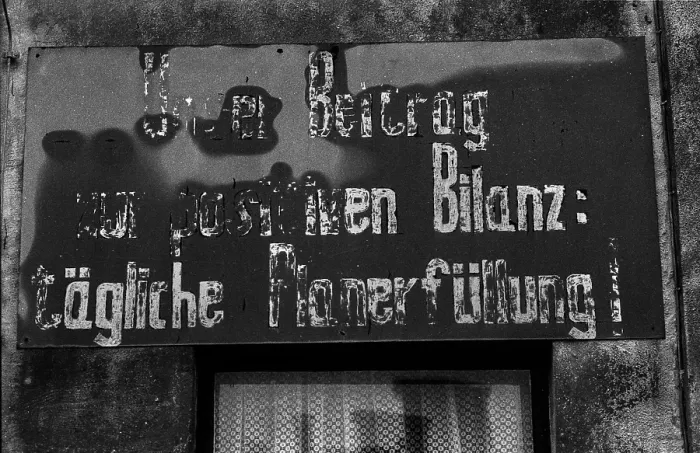 Framed Print : Germany, Sternberg, 01.02.1992, Plan fulfilment sign: Our contribution to the positive balance: daily plan fulfilment!, Europe Framed Print : Germany, Sternberg, 01.02.1992, Plan fulfilment sign: Our contribution to the positive balance: daily plan fulfilment!, Europe