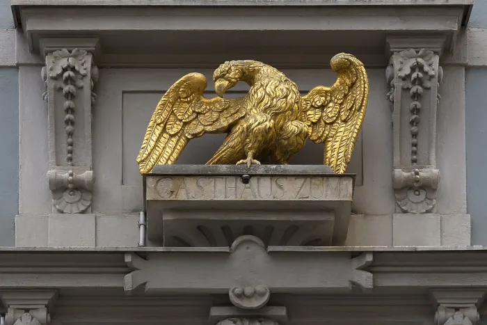 Framed Print : Gilded eagle figure at the Gasthaus zum Goldener Adler