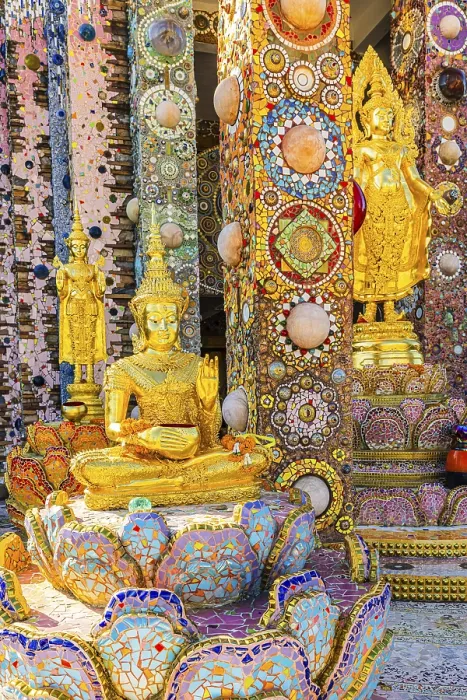 Framed Print : Gilded standing Buddha statues standing on pedestals decorated with mosaics and glass works of art Framed Print : Gilded standing Buddha statues standing on pedestals decorated with mosaics and glass works of art
