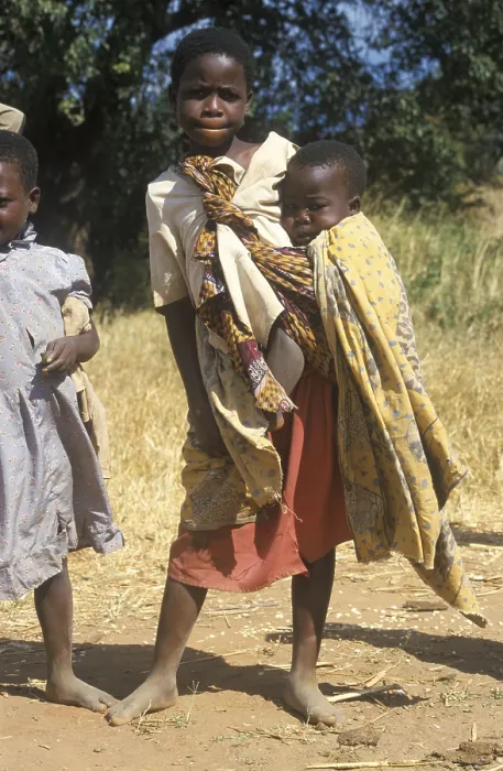Framed Print : Girl carrying a toddler, Bwangu Mzimba Framed Print : Girl carrying a toddler, Bwangu Mzimba