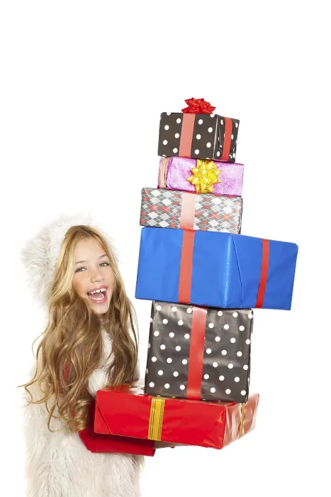 Framed Print : Girl with christmas present gifts stacked on white background