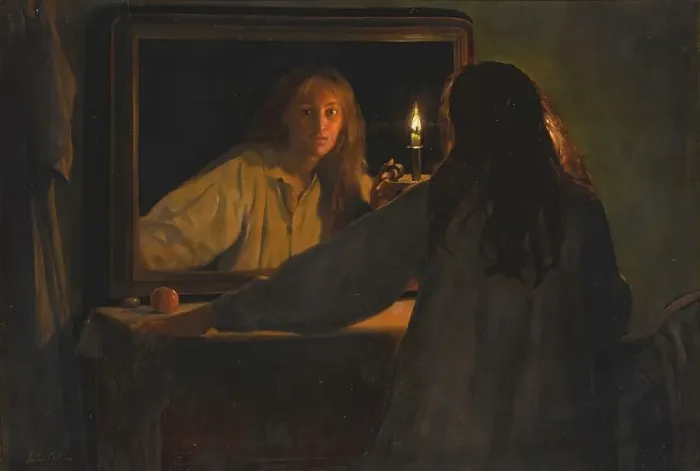 Framed Print : A girl looks at her reflection by candlelight