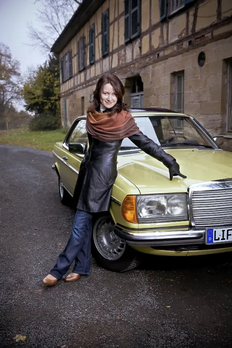 Framed Print : Girl in front of Post-War classic car Framed Print : Girl in front of Post-War classic car