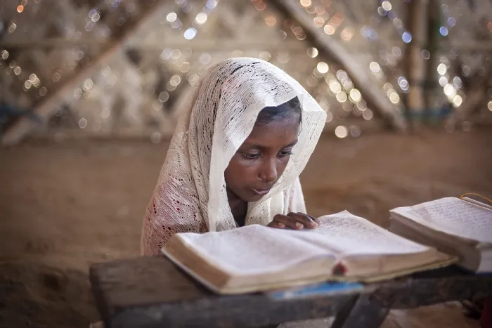 Framed Print : Girl reading in a madrasah, Koran school Framed Print : Girl reading in a madrasah, Koran school