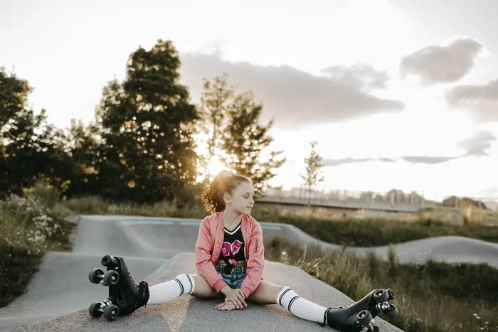 Framed Print : Girl with roller skates on a skating rink