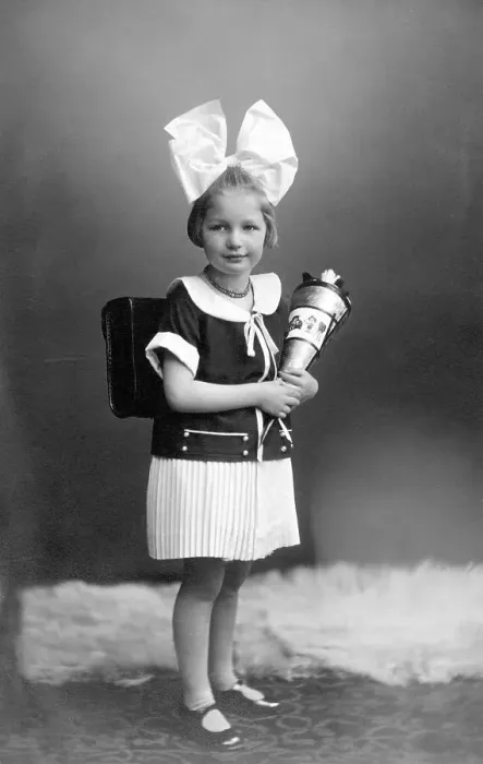 Framed Print : Girl with school bag and big hair bow ca