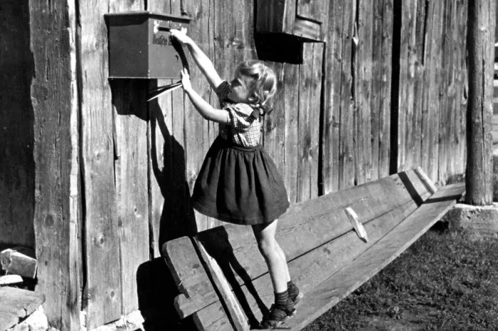 Framed Print : Girl trying to reach mailbox, ca Framed Print : Girl trying to reach mailbox, ca