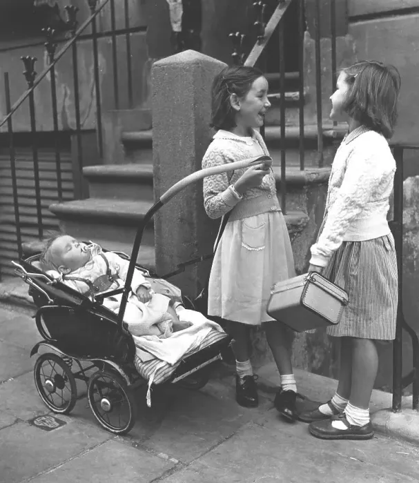 Framed Print : Two girls with baby and prams, England Framed Print : Two girls with baby and prams, England