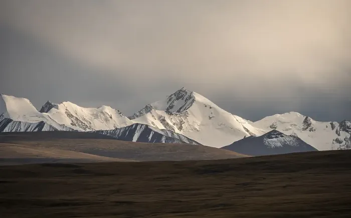 Framed Print : Glaciated and snow-capped mountains in the evening light