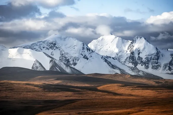 Framed Print : Glaciated and snow-covered mountains
