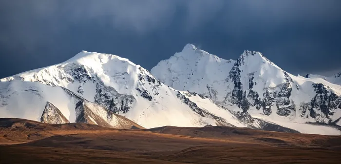 Framed Print : Glaciated and snow-covered mountains