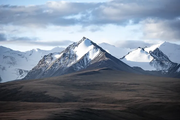 Framed Print : Glaciated and snow-covered mountains