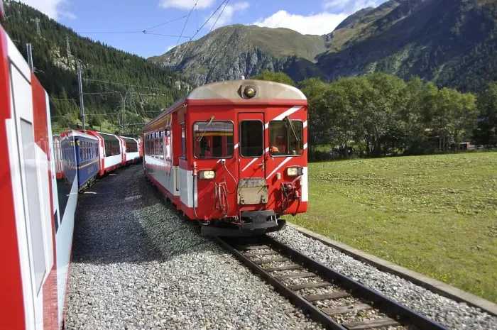 Framed Print : The Glacier Express train is driving across the swiss alps and through the Unesco World heritage from Zermatt to St