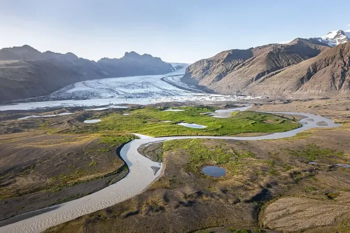 Framed Print : Glacier river in front of Mountains