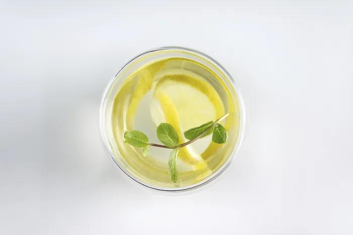 Framed Print : A glass of water, lemon and mint