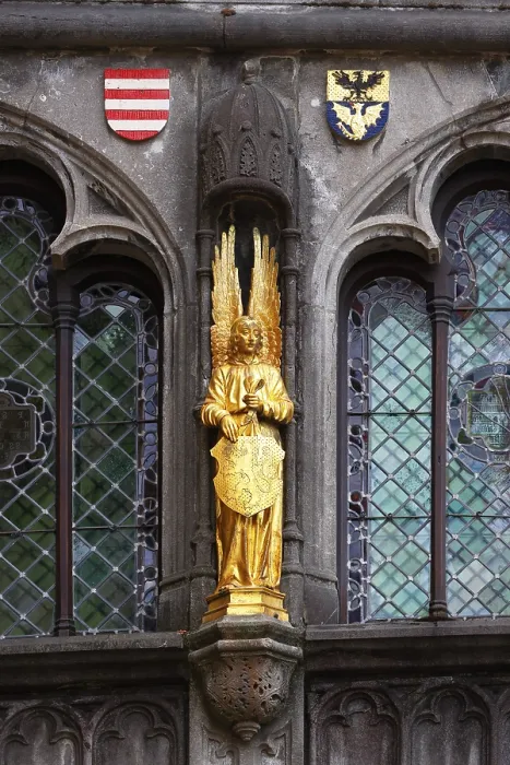 Framed Print : Golden Angel, figure on the facade of the St