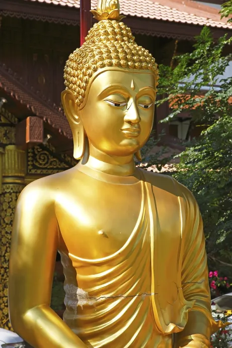 Framed Print : Golden Buddha figure in front of Wat Phra Bat Ming Muang Framed Print : Golden Buddha figure in front of Wat Phra Bat Ming Muang