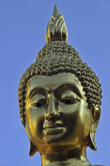 Framed Print : Golden Buddha statue with flame of enlightenment Framed Print : Golden Buddha statue with flame of enlightenment