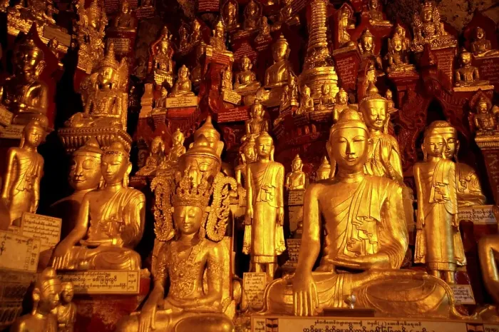 Framed Print : Many golden Buddha statues in Pindaya Cave Shan State Burma