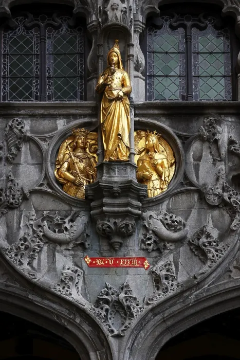 Framed Print : Golden figures on the richly decorated facade of the St