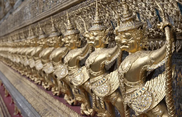 Framed Print : Golden figures warrior in royal palace stand in row