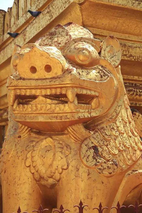 Framed Print : Detail of a golden guardian statue in front of Shwezigon Pagoda in Nyaung-U