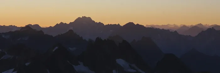 Framed Print : Golden morning light over rugged Swiss mountains