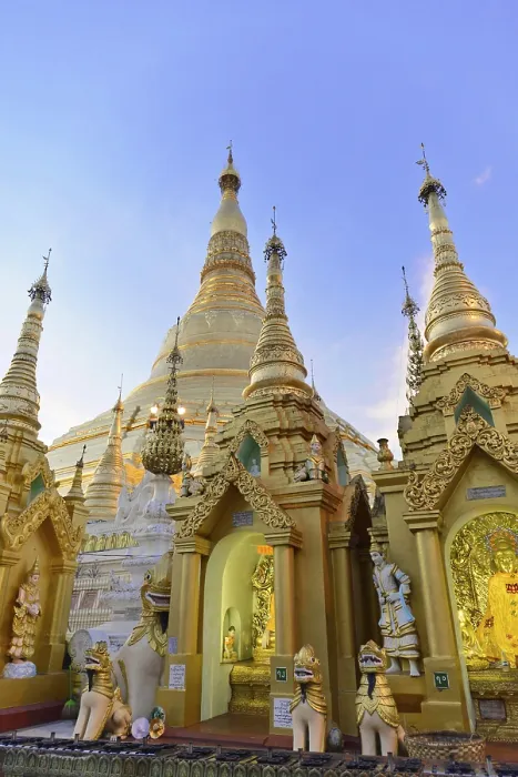 Framed Print : Golden pagoda and towers in evening light against a clear sky