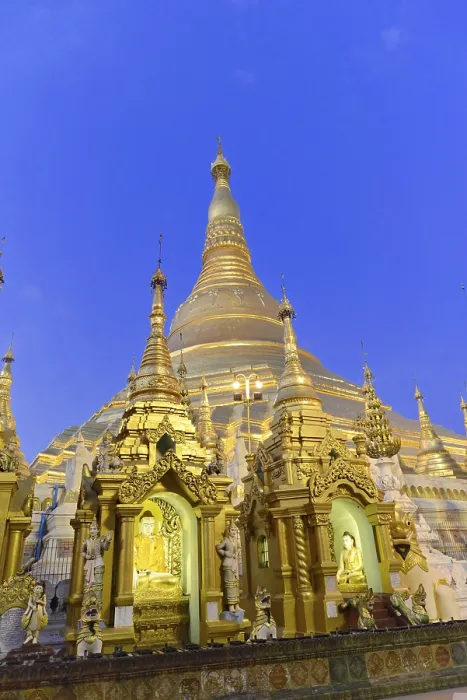 Framed Print : Golden stupas shining in evening light against deep blue sky Framed Print : Golden stupas shining in evening light against deep blue sky