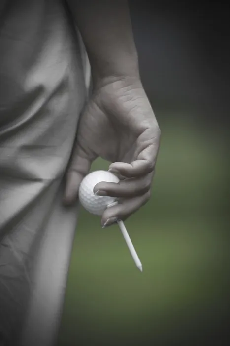 Framed Print : Golfer Holding a Golf Ball and a Tee, Switzerland