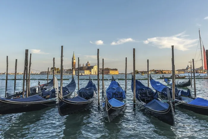 Framed Print : Gondolas moored at sunset with the island of san giorgio maggiore in the background Framed Print : Gondolas moored at sunset with the island of san giorgio maggiore in the background
