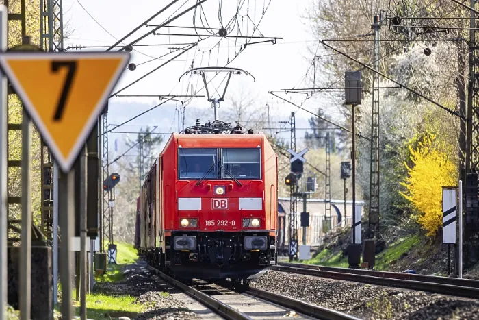Framed Print : Goods train with a Deutsche Bahn AG locomotive travelling on the open track Framed Print : Goods train with a Deutsche Bahn AG locomotive travelling on the open track