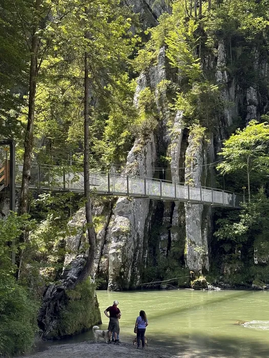 Framed Print : Gorge with a footbridge, steep cliffs and walkers