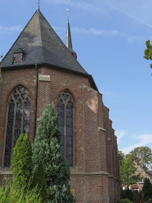 Framed Print : A gothic brick church with ornate windows against a clear blue sky Framed Print : A gothic brick church with ornate windows against a clear blue sky