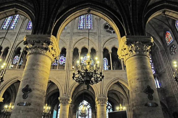 Framed Print : Gothic cathedral with magnificent columned arcades and decorative chandeliers