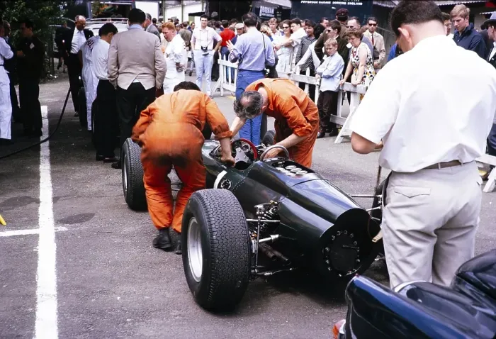 Framed Print : Graham Hill BRM P261 race car mechanic at work, Grand Prix of Belgium 1964, Spa, Belgium, Raymond Mays in the background, Europe