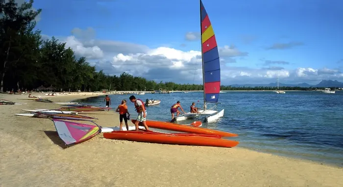 Framed Print : Grand Baie, beach at Club Med, surfers, catamaran. Mauritius Island, Indian Ocean