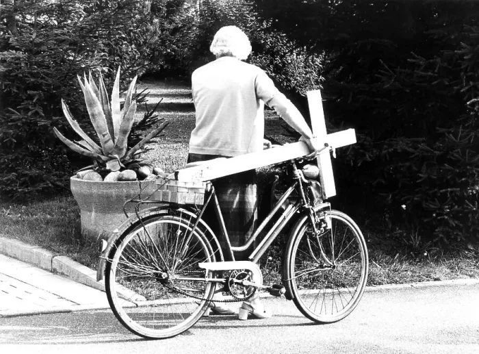 Framed Print : Grandma with cross on bicycle, ca Framed Print : Grandma with cross on bicycle, ca