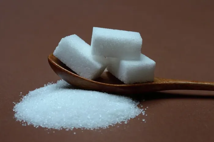 Framed Print : Granulated sugar and sugar cubes in spoons, sugar