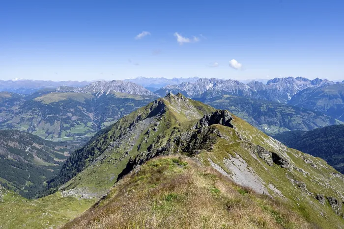 Framed Print : Grassy mountain ridge and view of the Lesach Valley